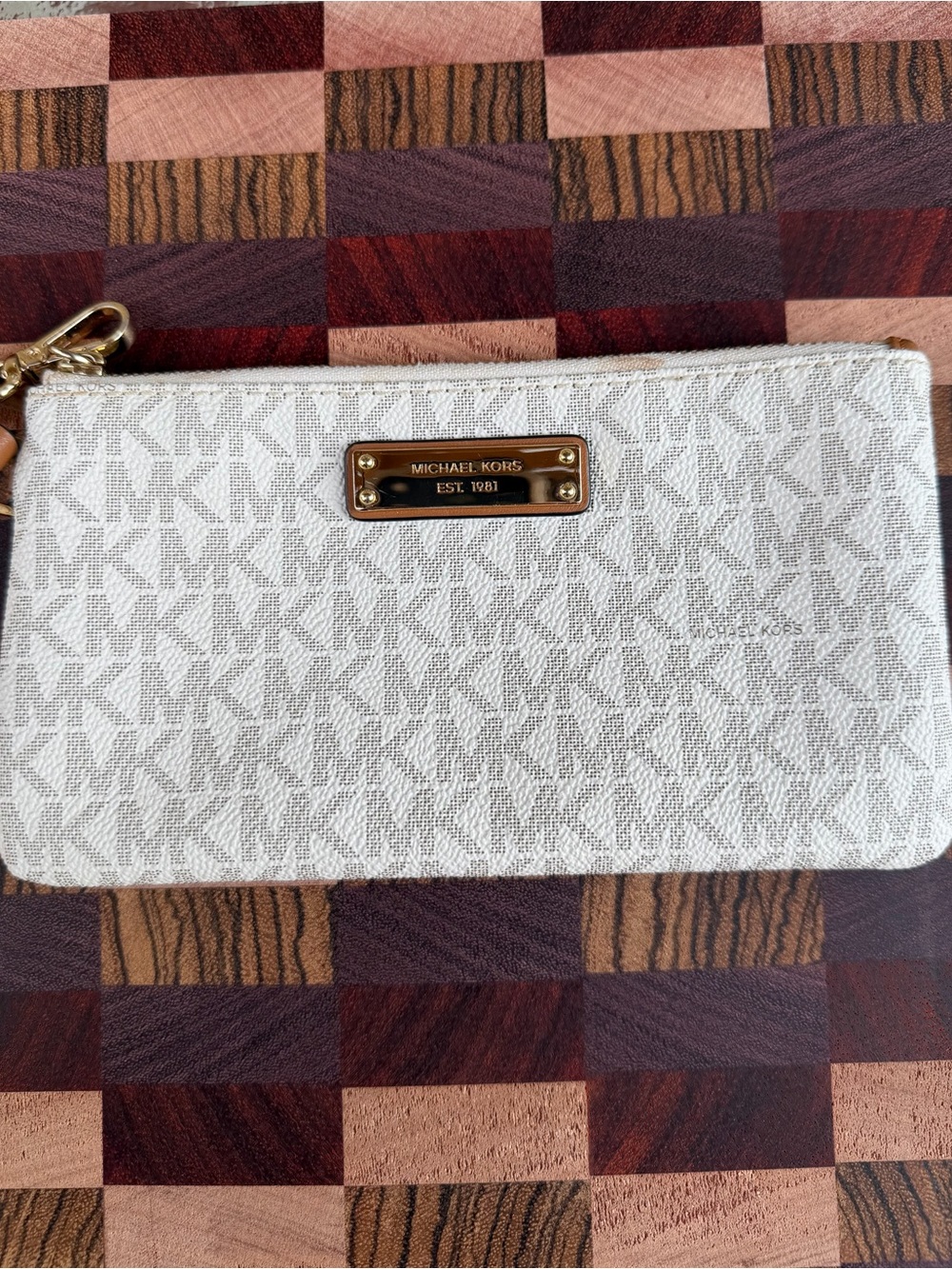 Michael Kors Ivory Logo Wristlet with Gold Plate